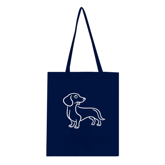 Navy blue tote bag with a white dog illustration on a white background