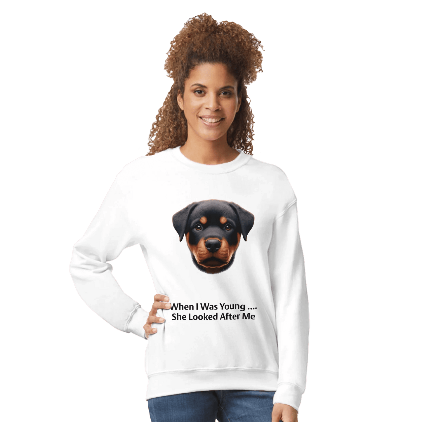 Woman wearing a white sweatshirt with a dog graphic and text on a green background